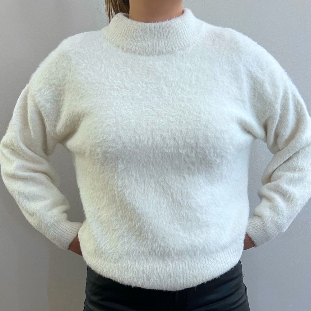 women’s cozy sweater by Carrie underwood.